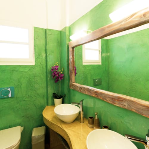 a bathroom with a sink and toilet