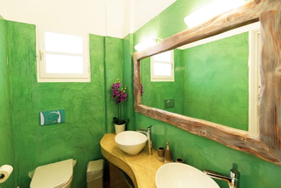 a bathroom with a sink and toilet