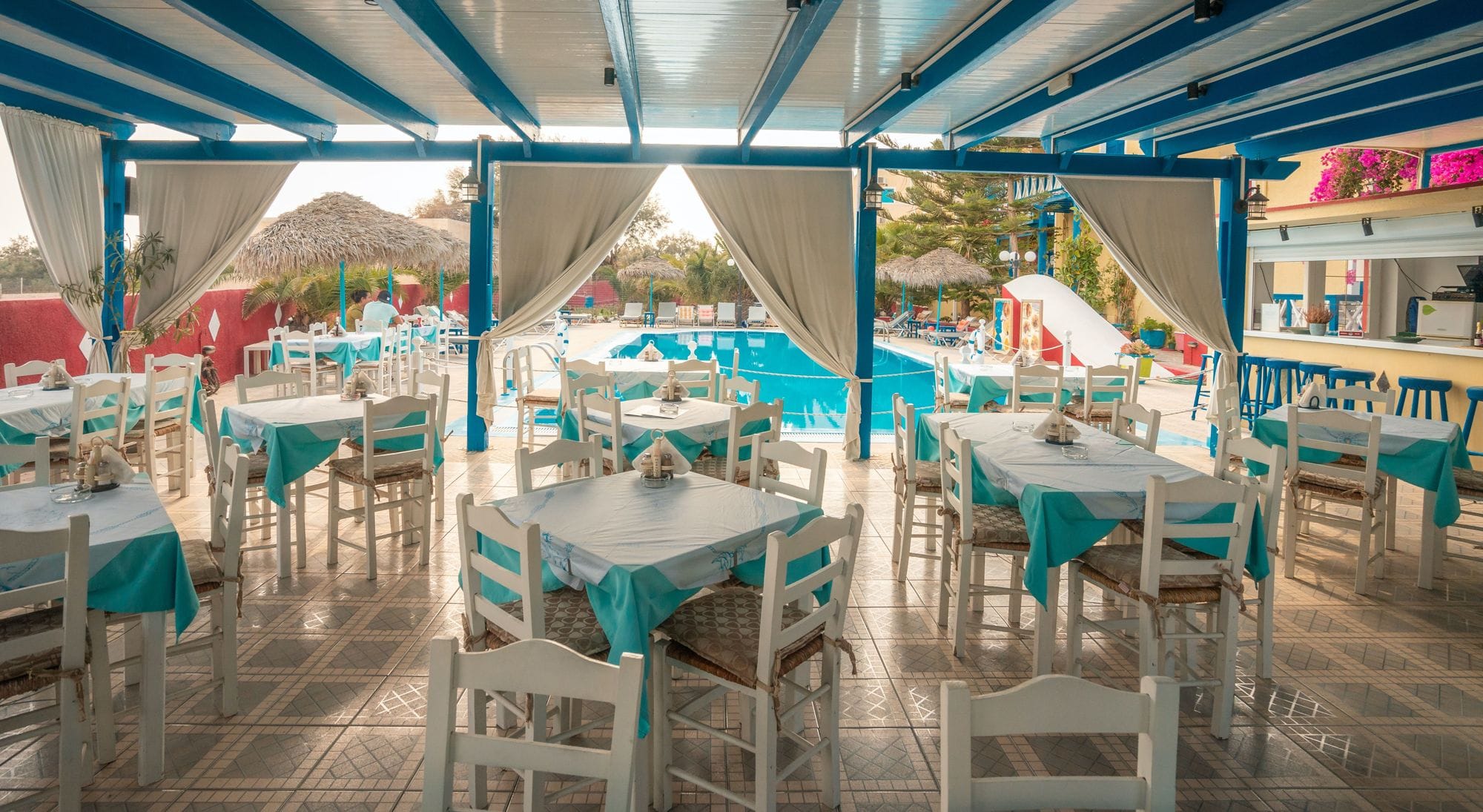 a room with tables and chairs