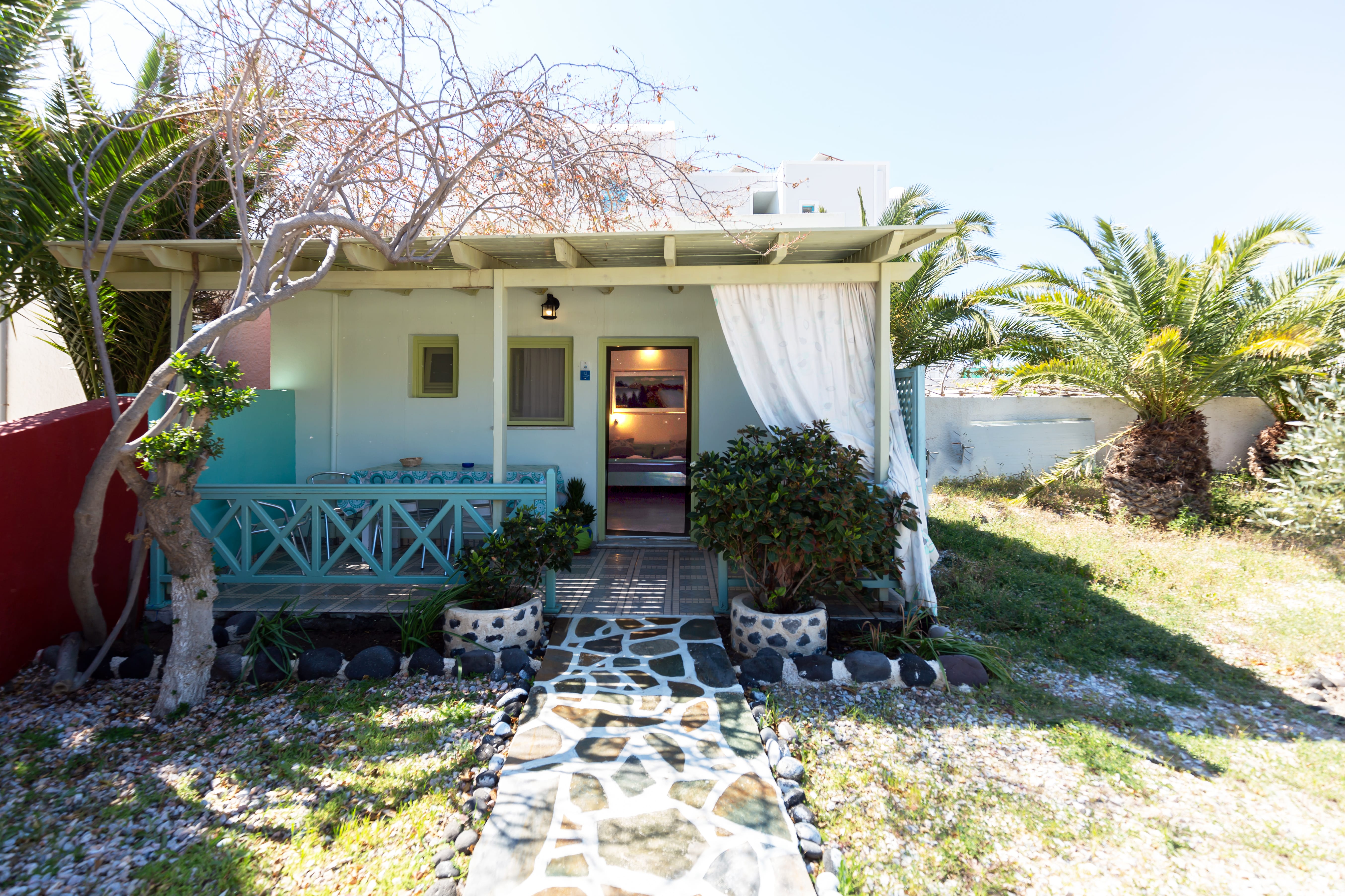 a house with a deck and trees