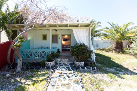 a house with a deck and trees