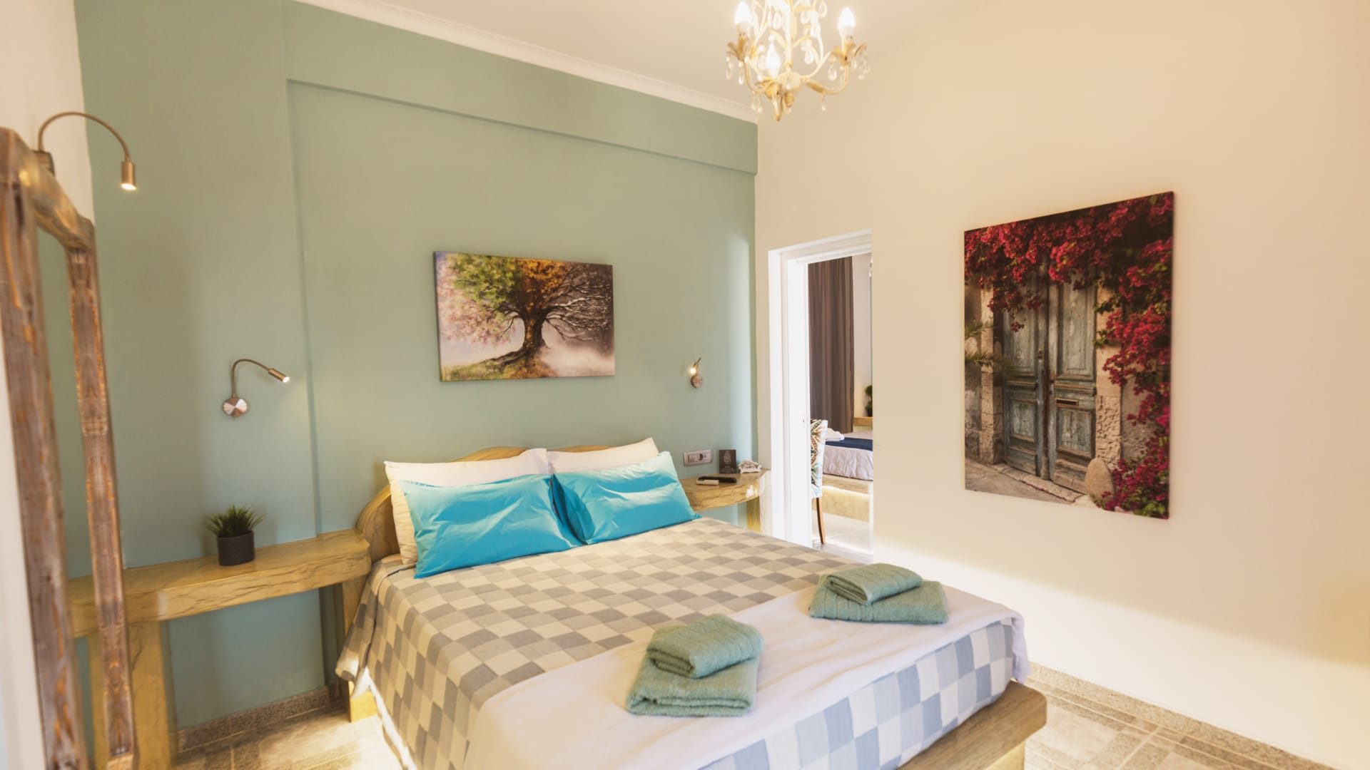 a bedroom with a bed and a lamp