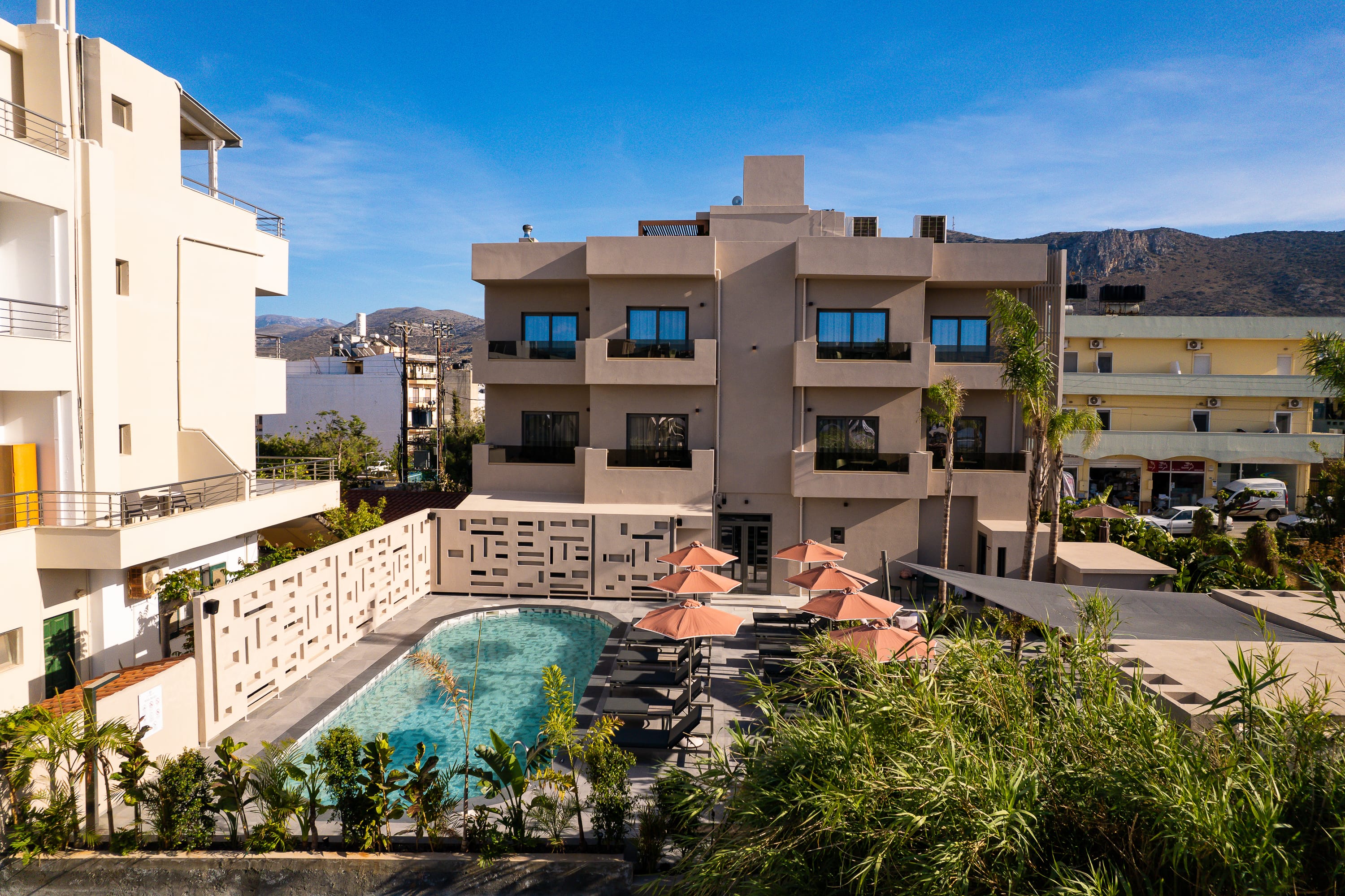 a building with a pool in front