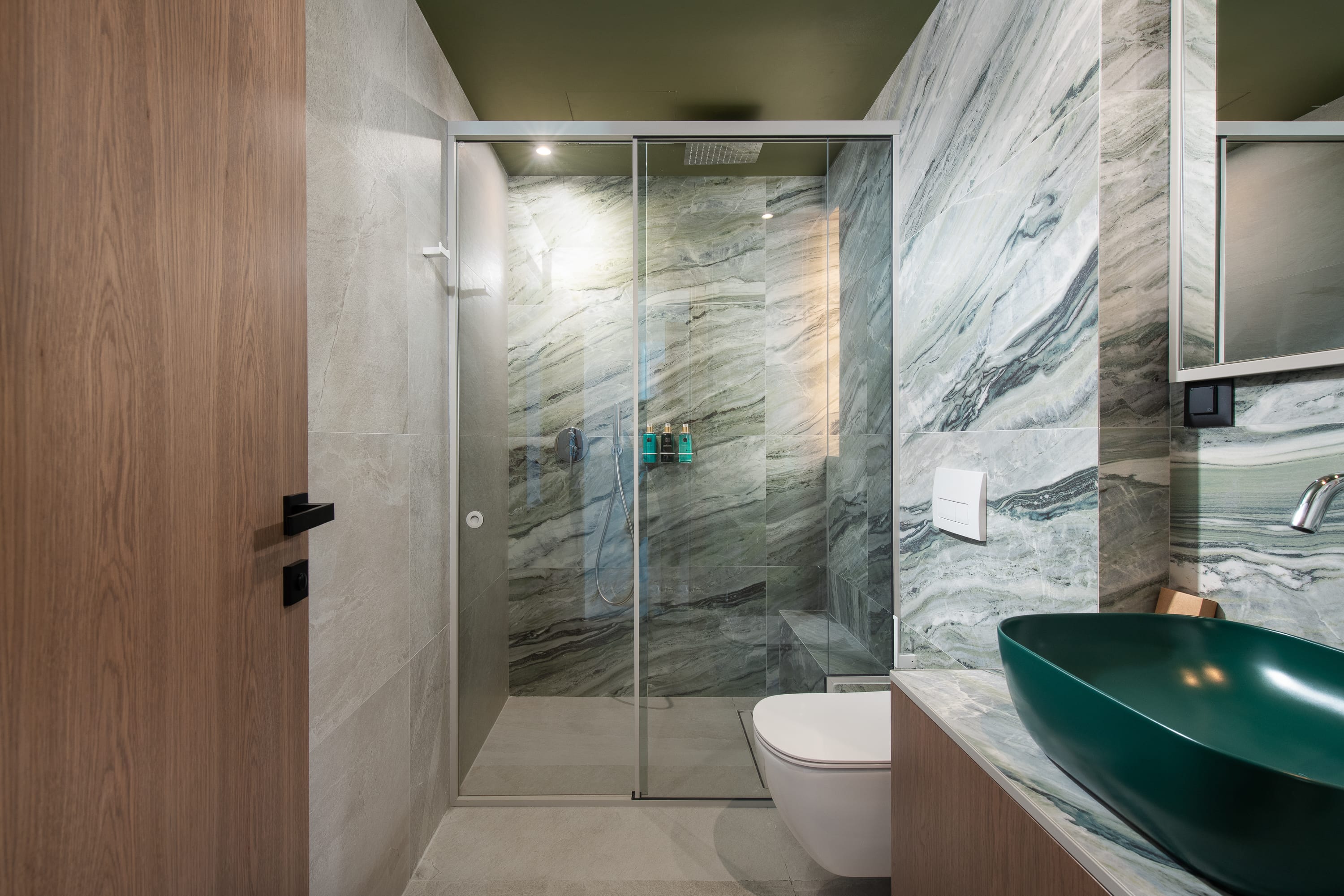 a bathroom with a glass shower