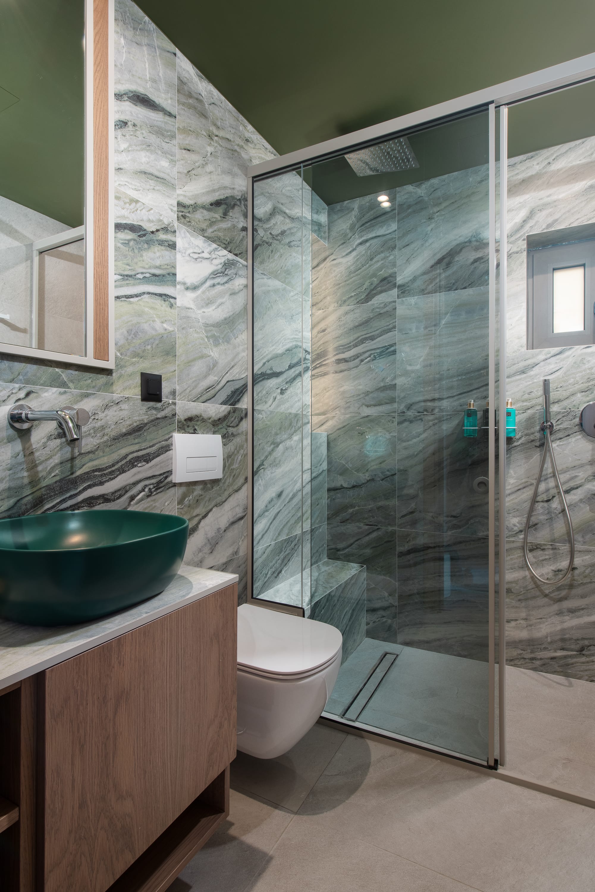 a bathroom with a glass shower