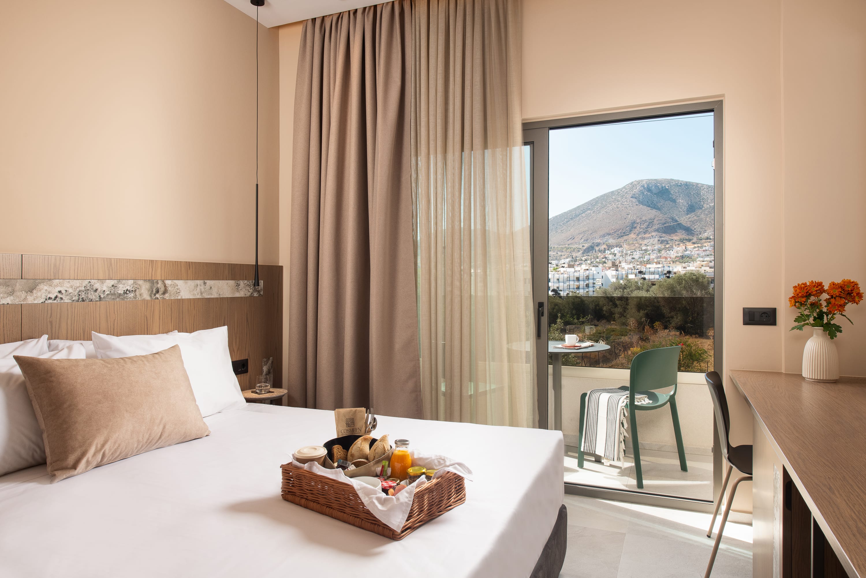 a bedroom with a large window