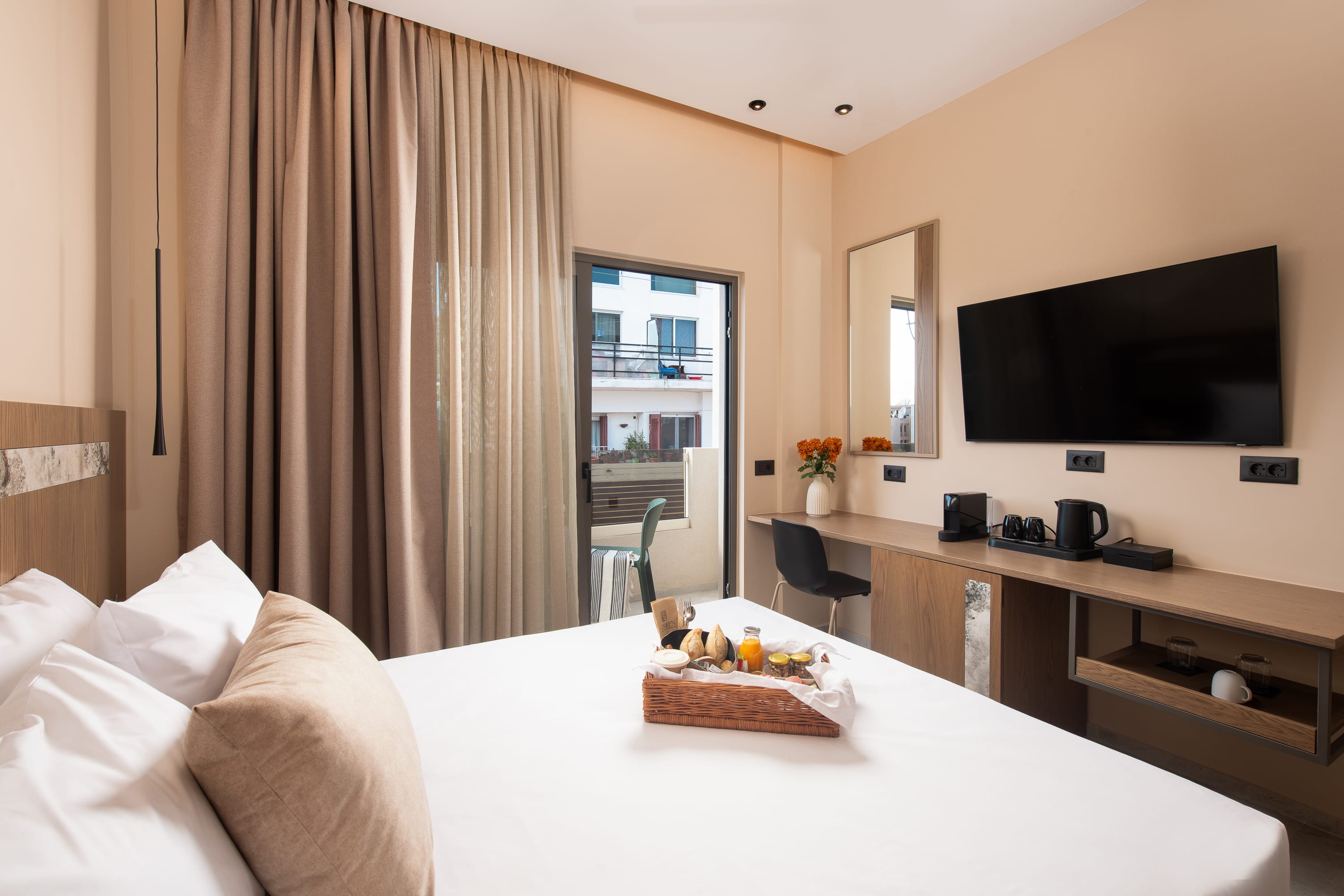 a room with a bed and a tv