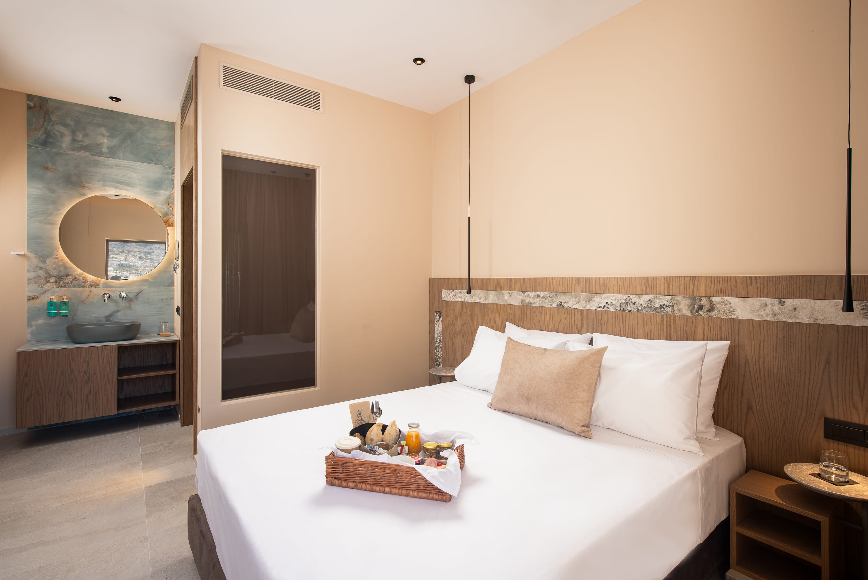 a bed with a white bed spread