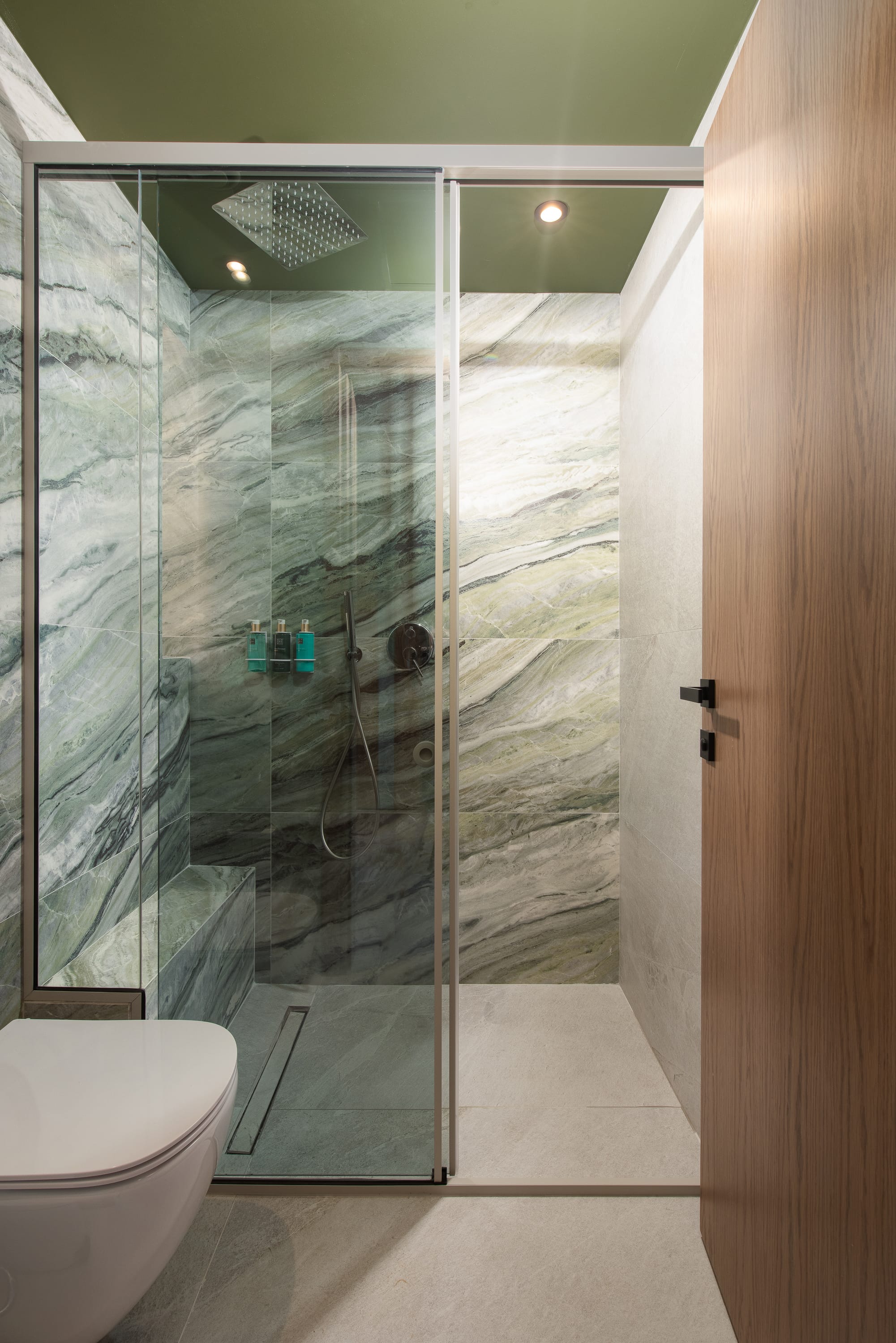 a shower with glass doors