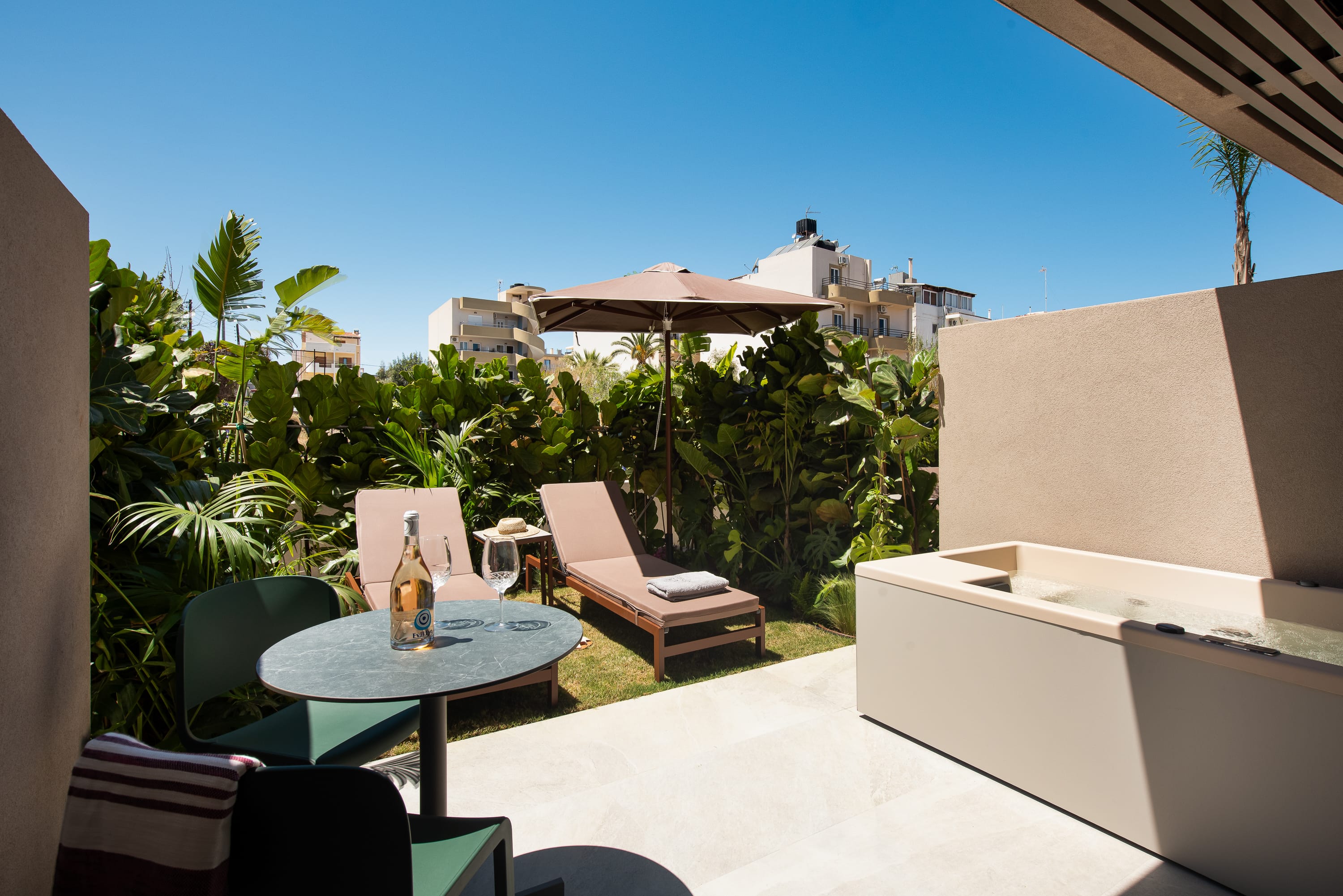 a table and chairs on a balcony