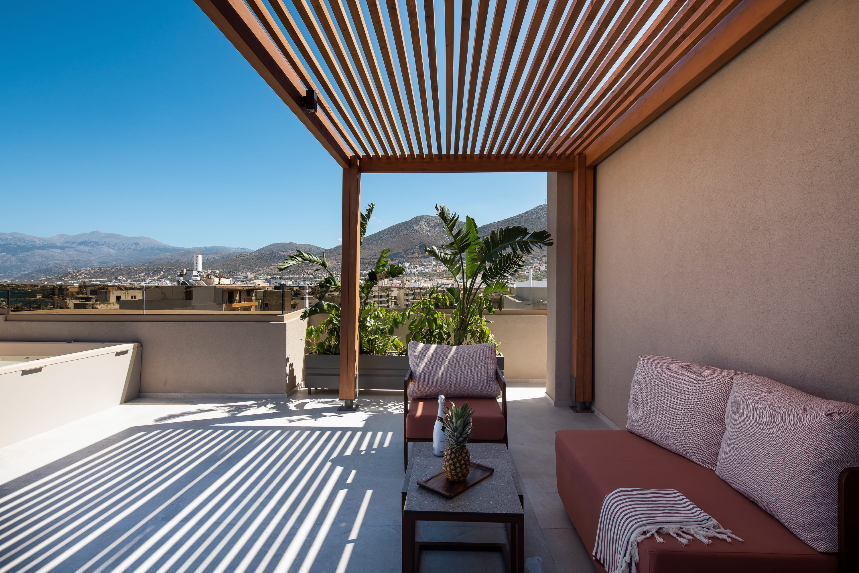 a room with a deck and chairs