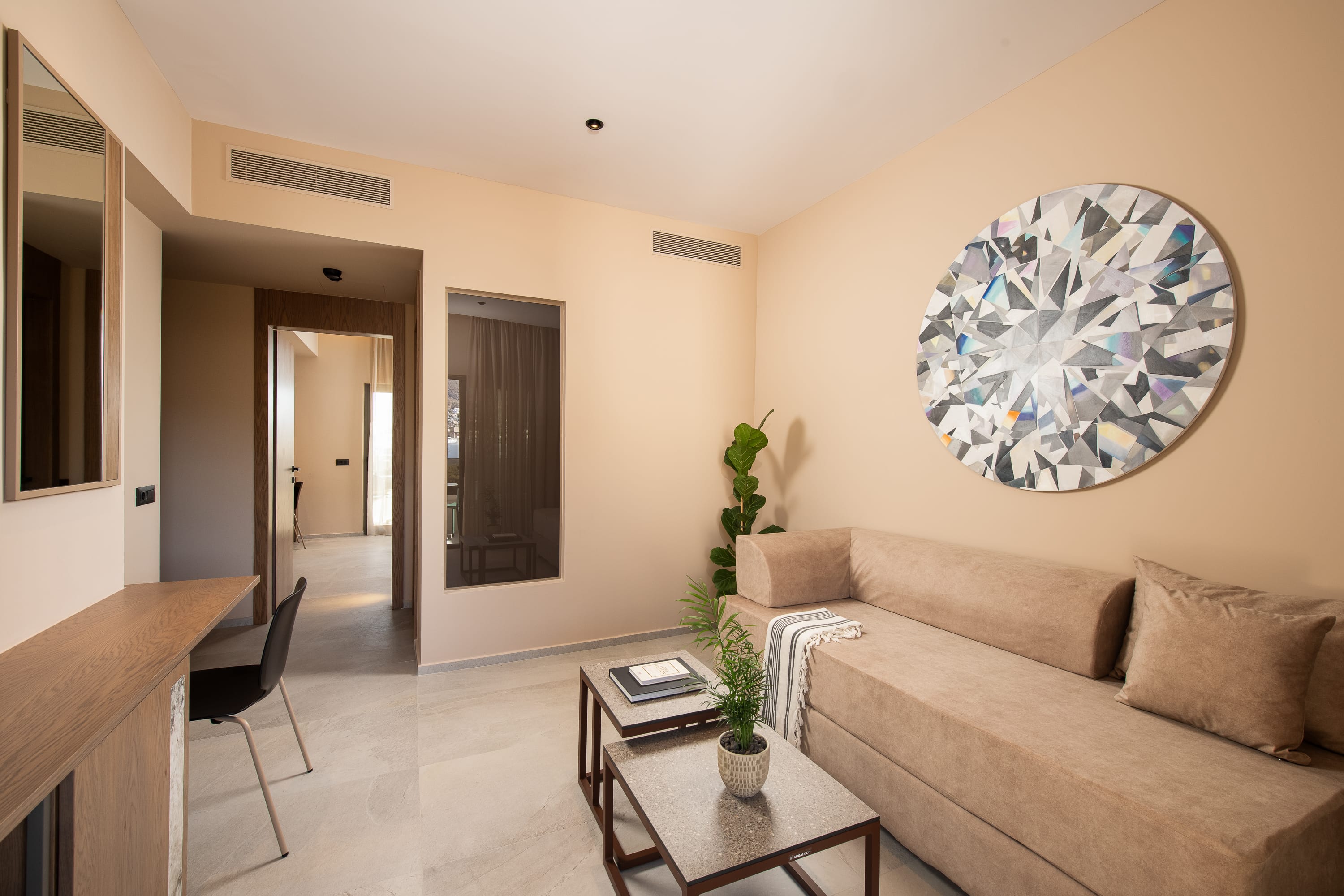 a living room with a couch and a table