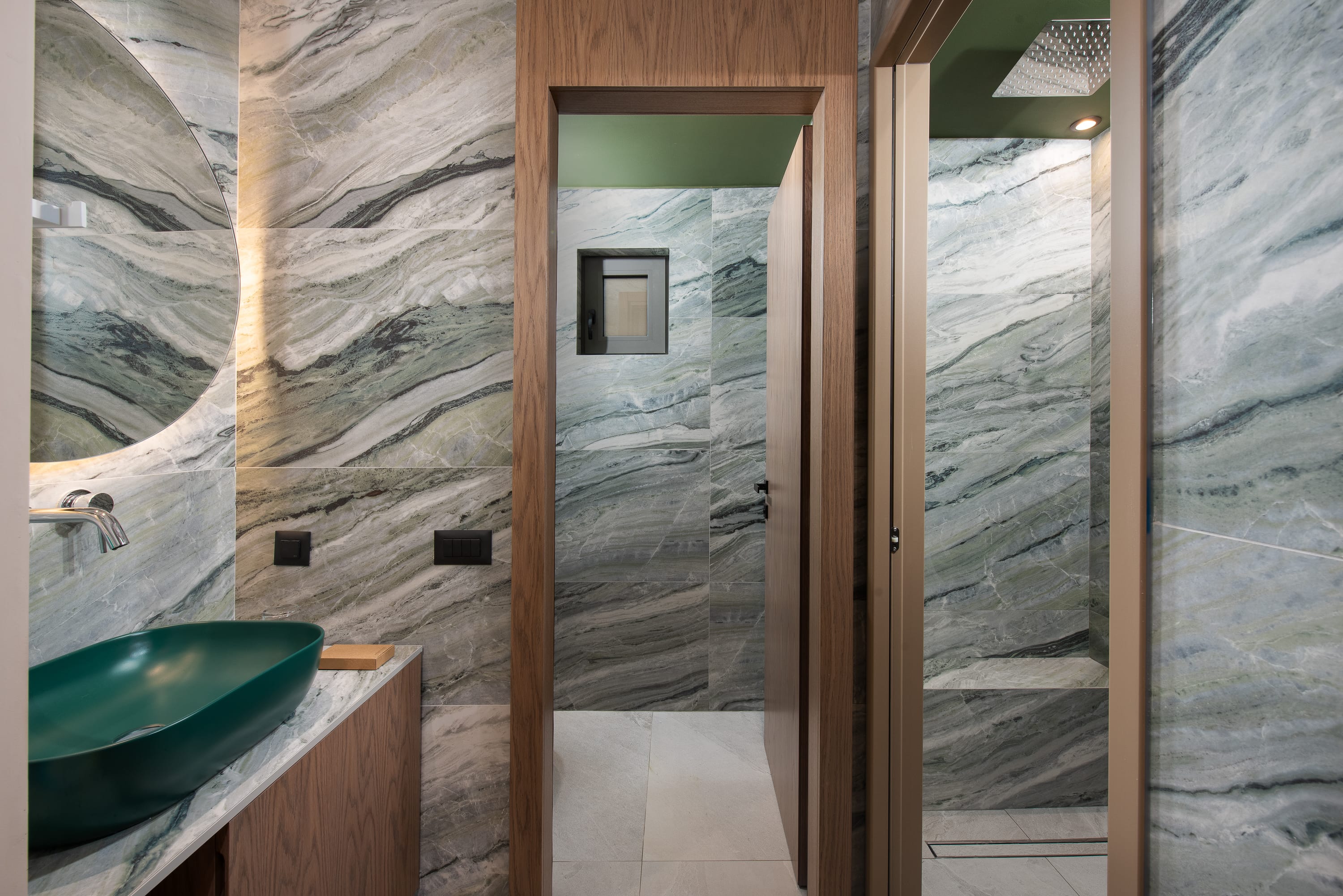 a bathroom with a glass door