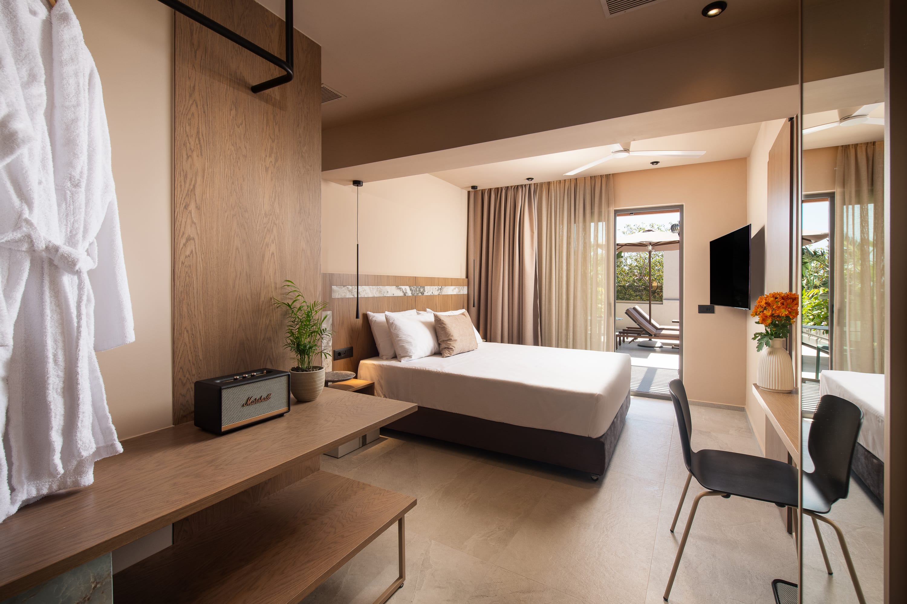 a bedroom with a bed and a desk