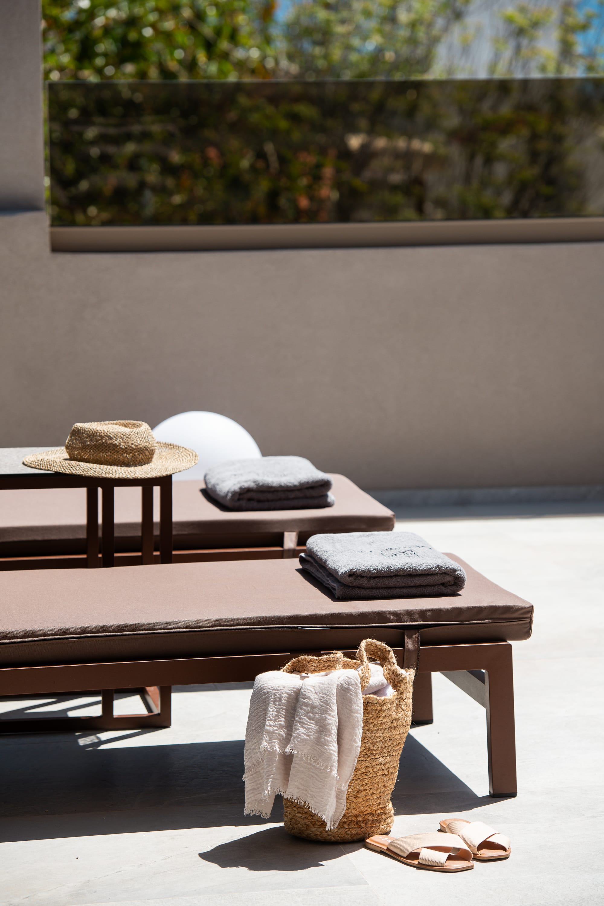 a table with a couple of pillows and a blanket on it