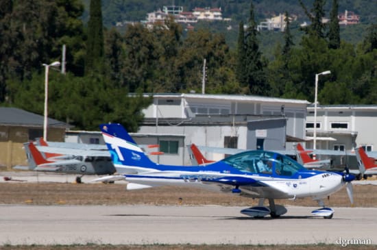 a couple of airplanes on a runway