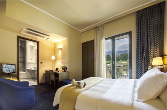 a dog laying on a bed