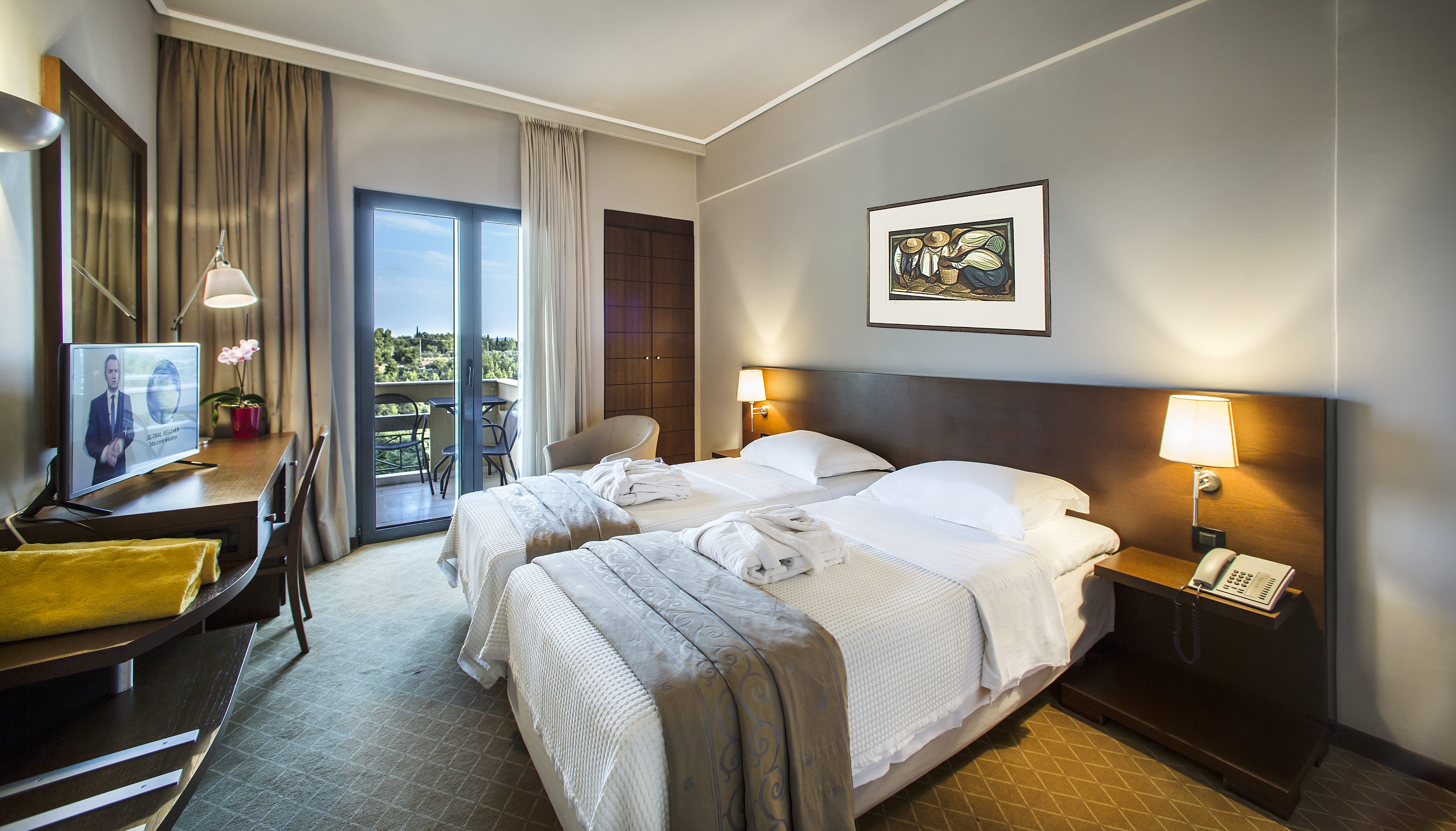 a hotel room with two beds