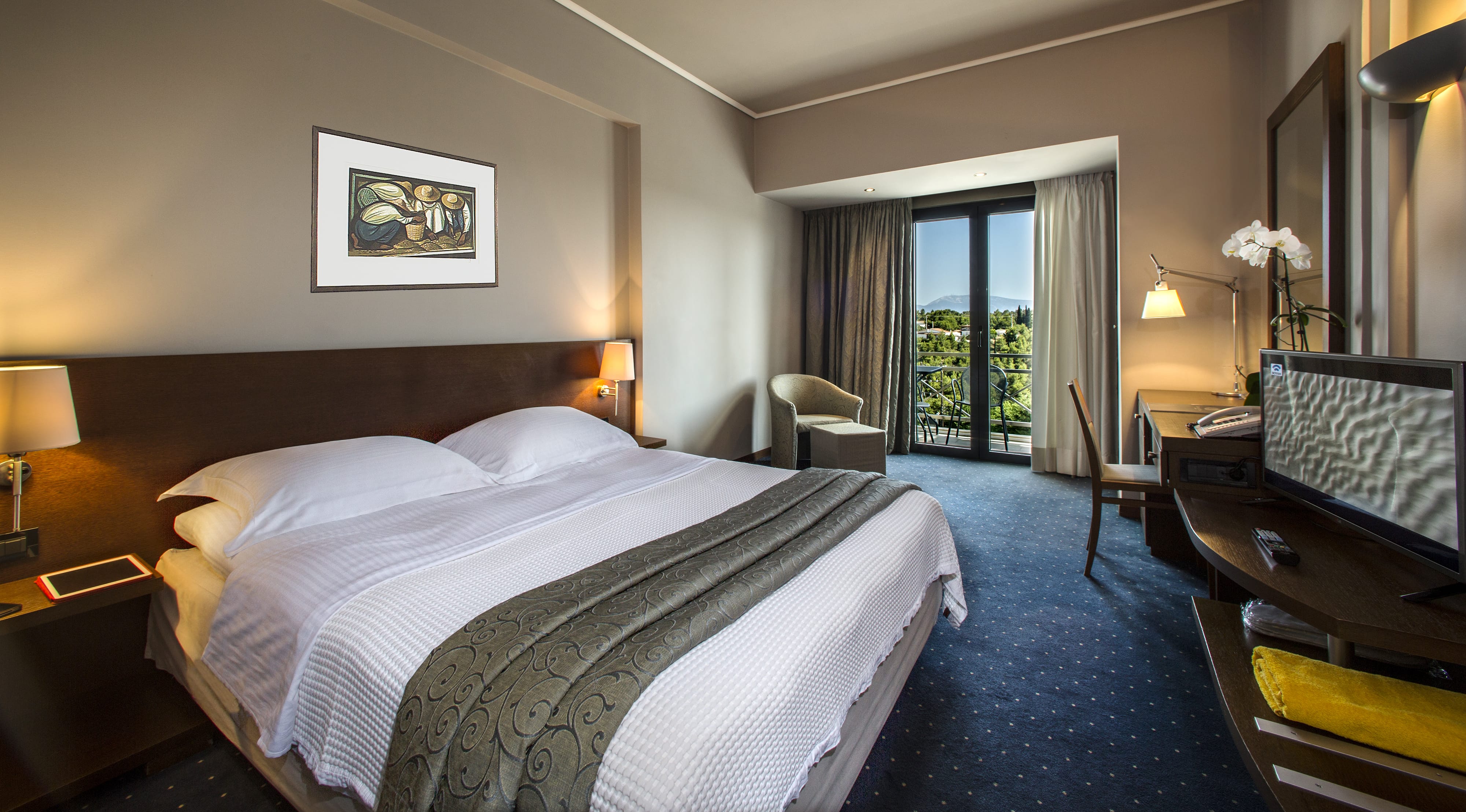 a hotel room with a large bed