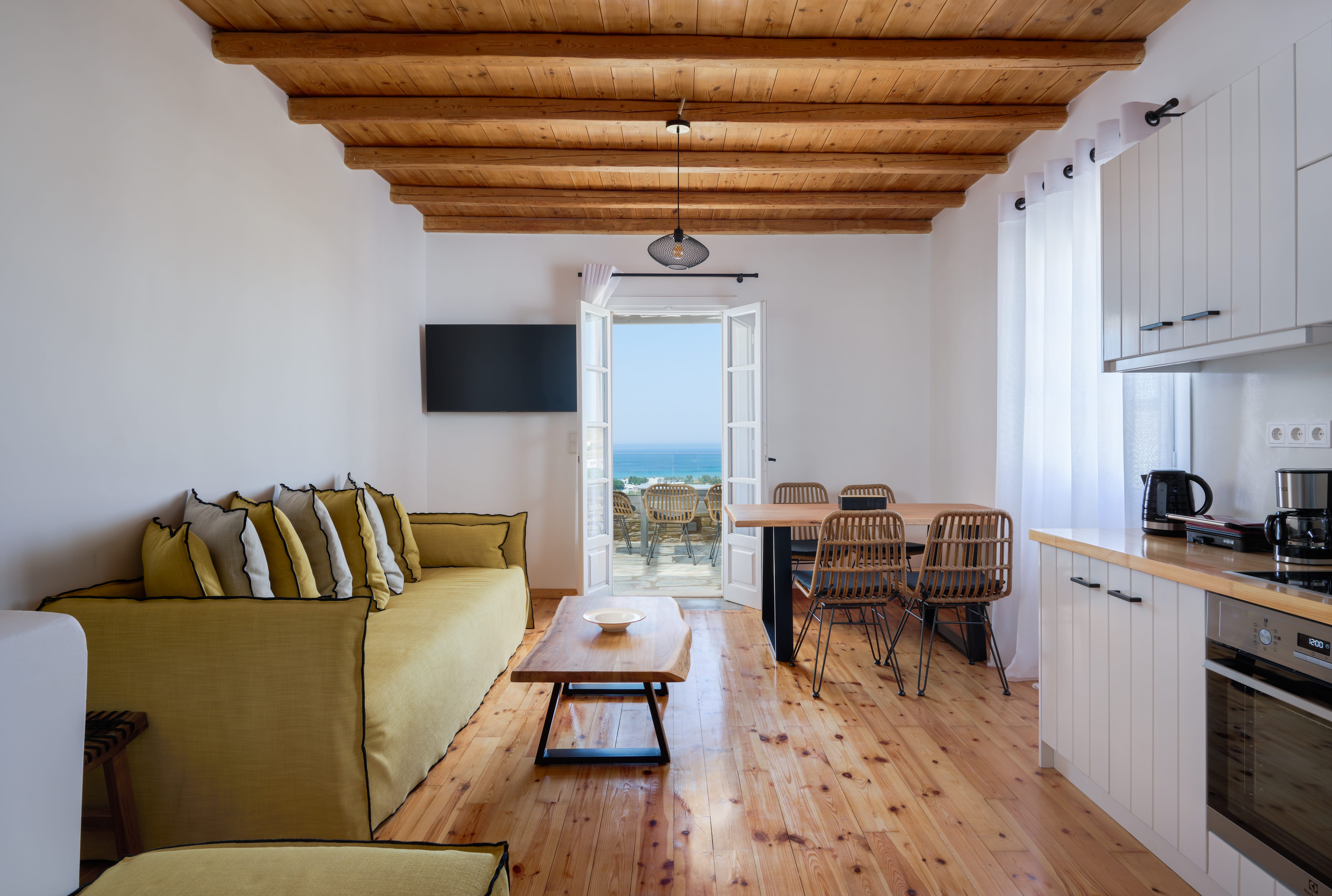 a living room with a yellow couch