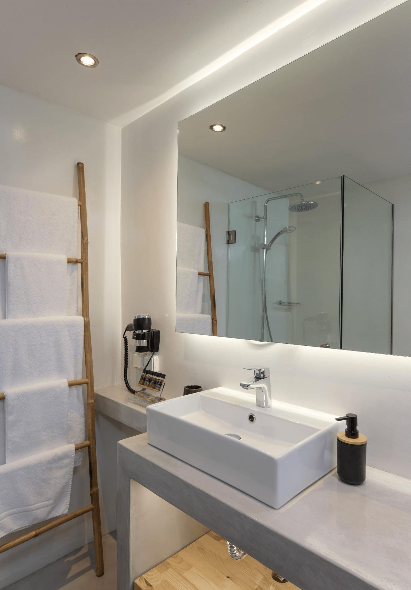 a bathroom with a large mirror