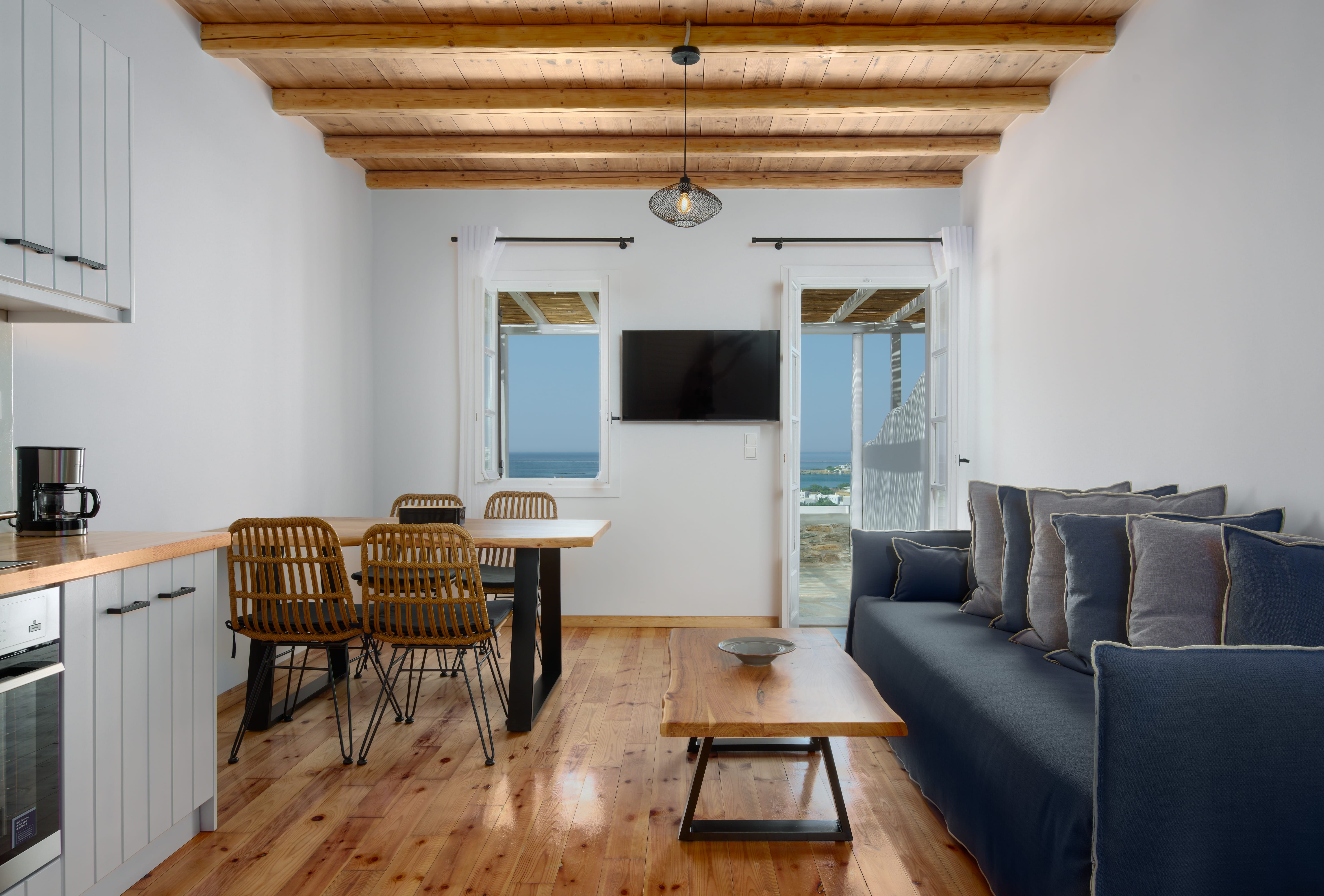 a living room with a couch and a table