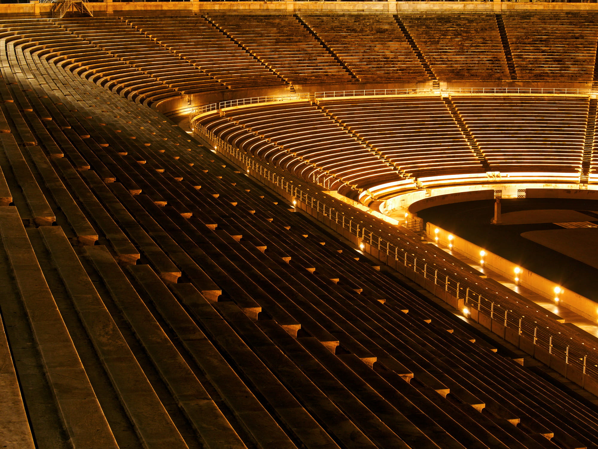 an empty stadium with lights