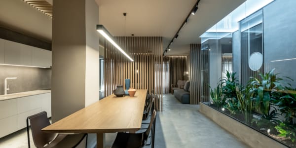 a room with a table and chairs