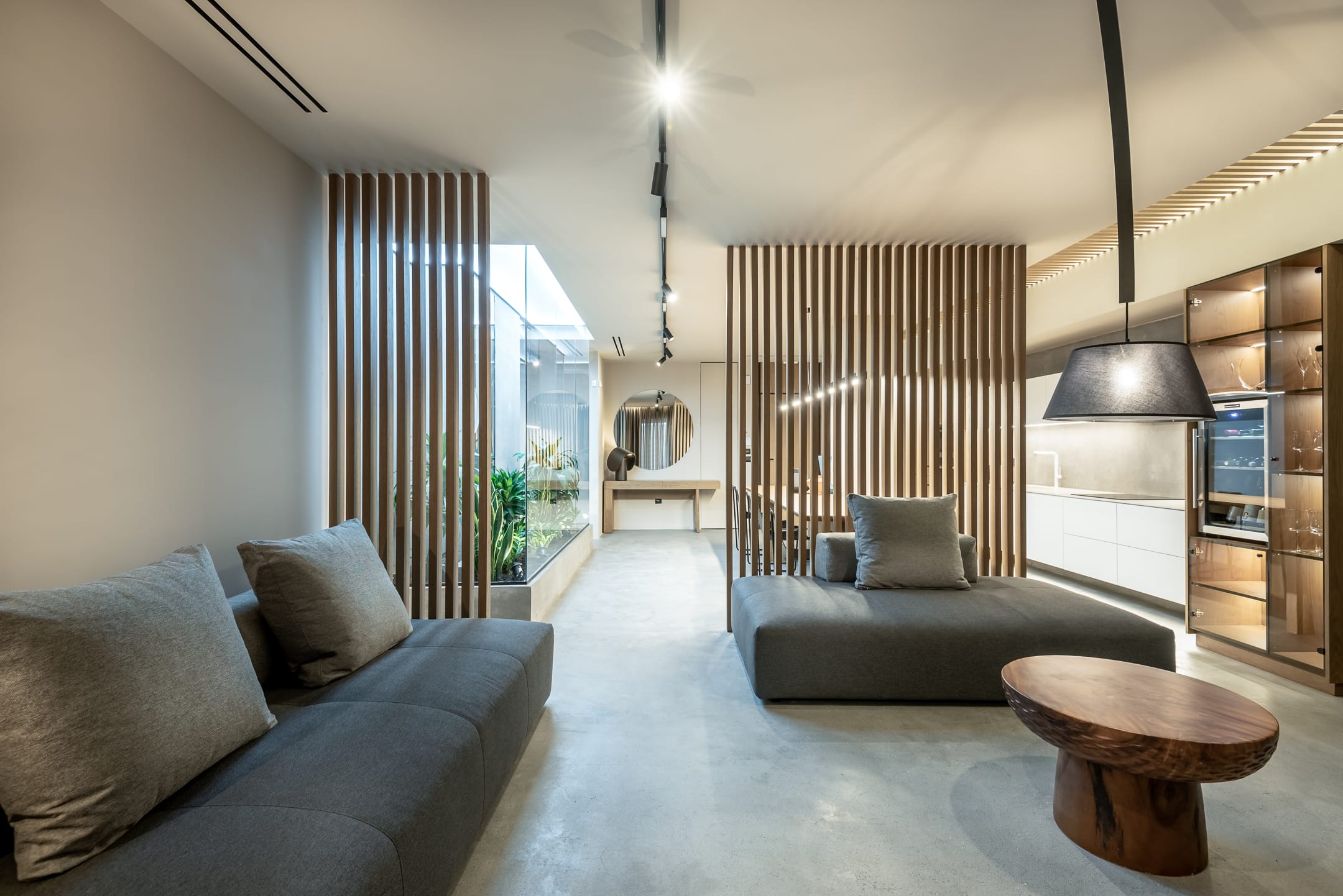a living room with a couch and a table