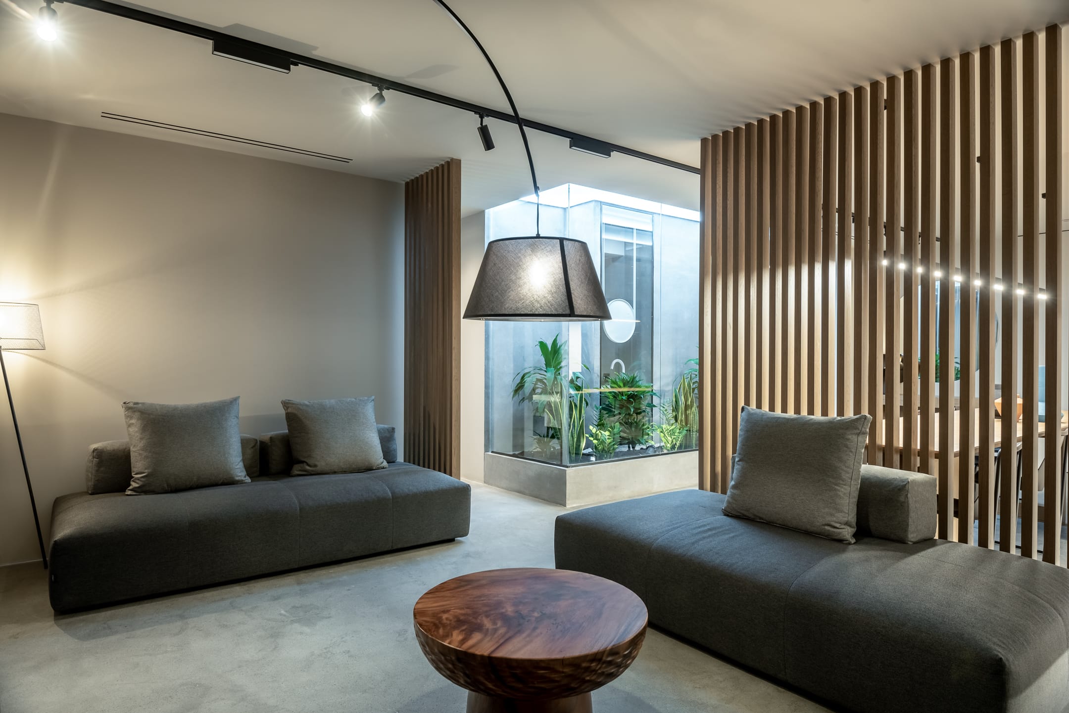 a living room with a couch and a table