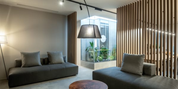 a living room with a couch and a table