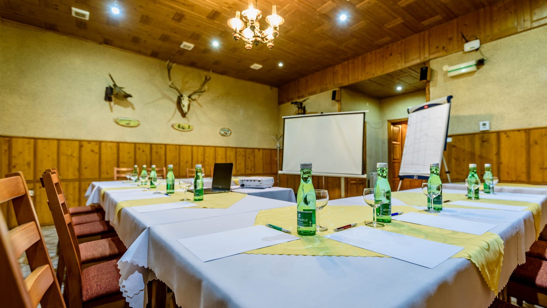 a room with a table and chairs