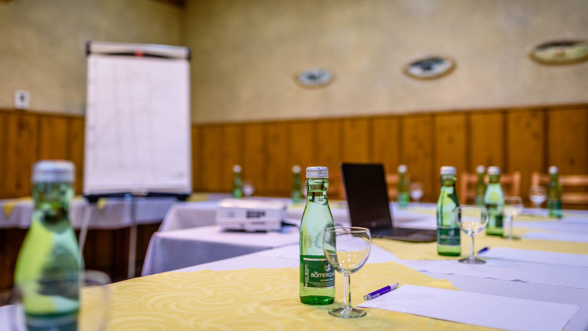 a table with bottles and glasses on it