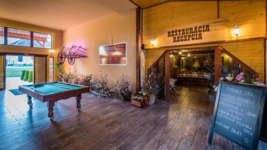 a room with a table and chairs