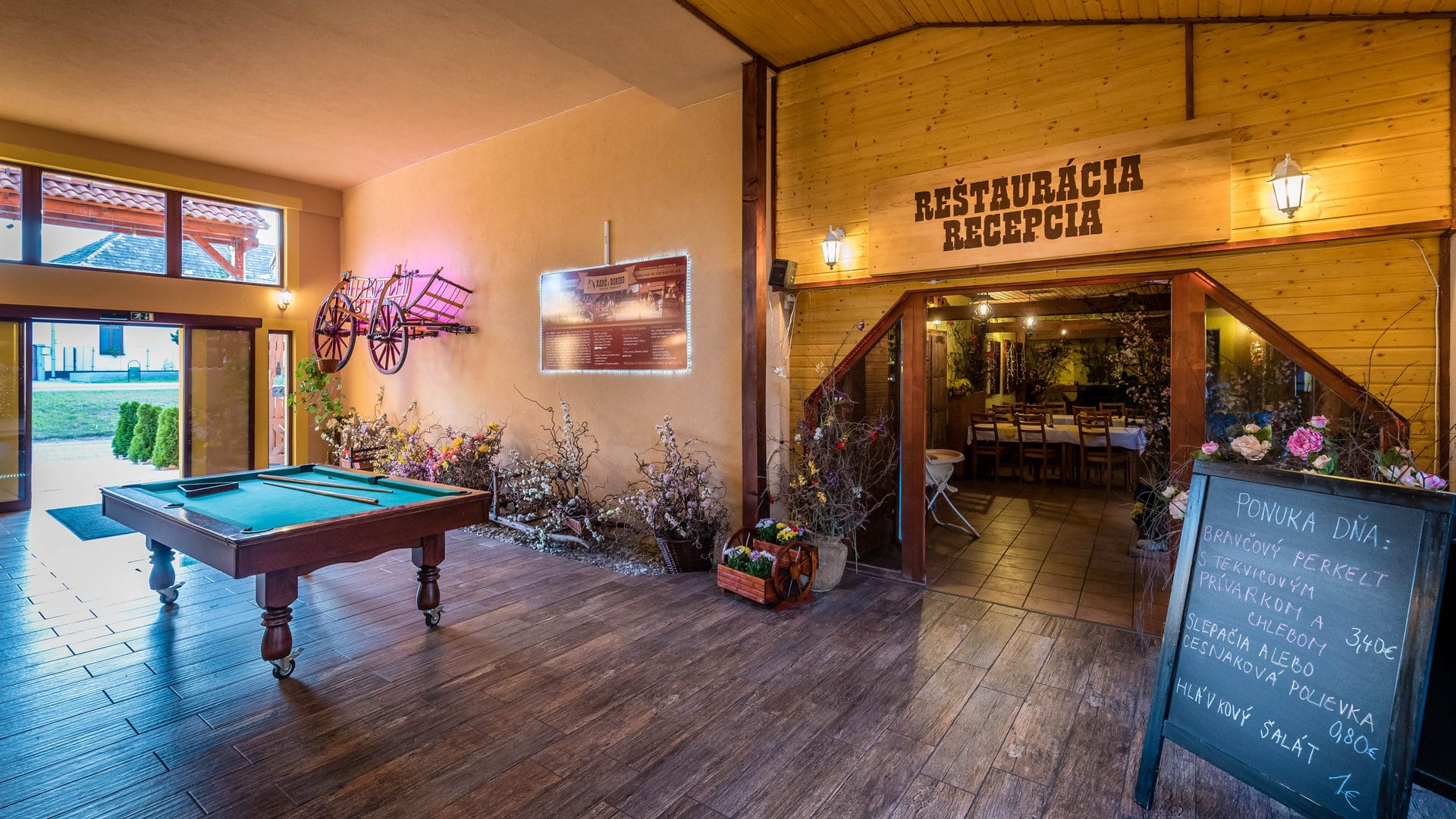 a room with a table and a sign