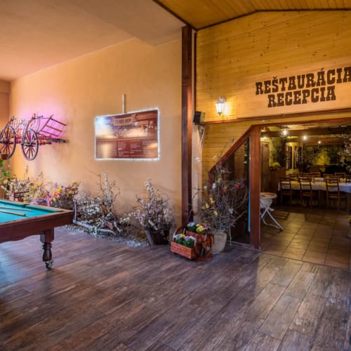 a room with a table and a sign