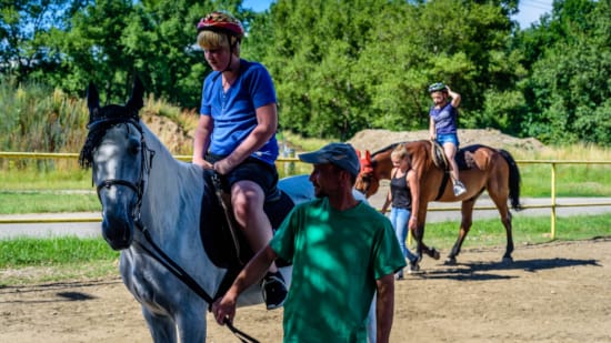 a man riding a horse