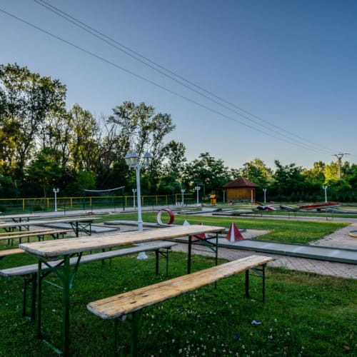 a park with picnic tables