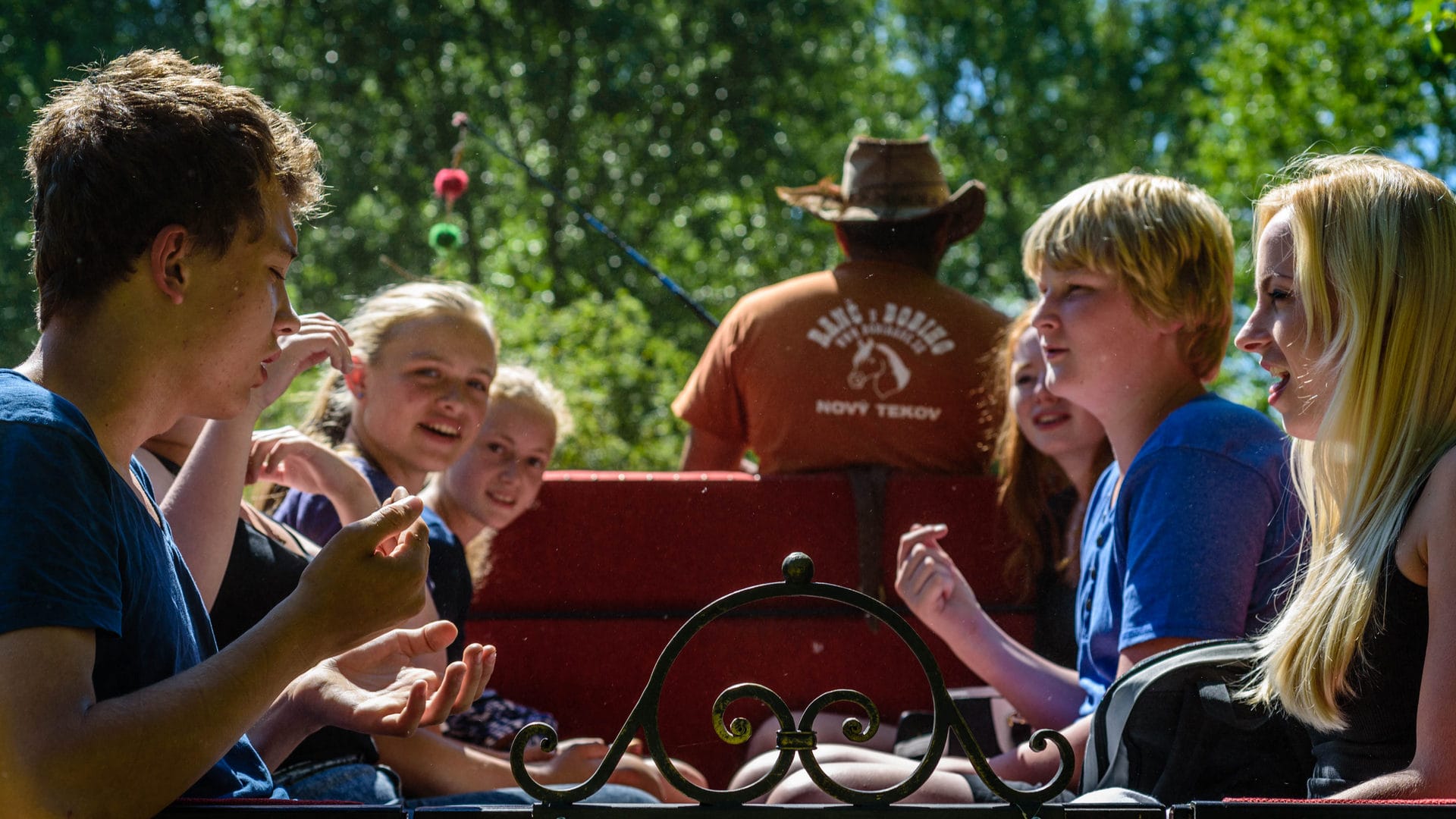 a group of people sitting outside