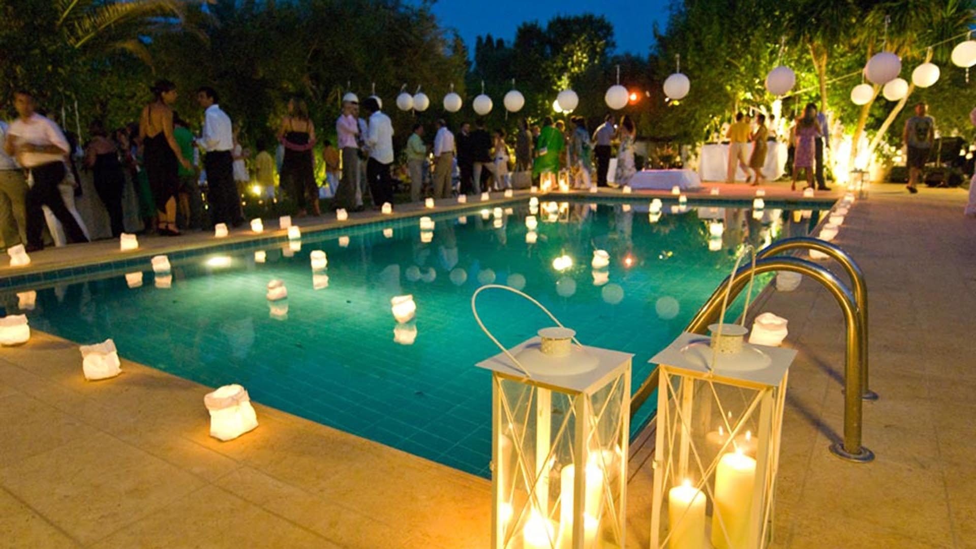 a pool with people around it