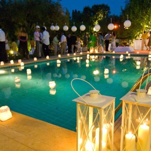 a pool with people around it