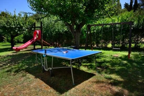 a trampoline in a yard
