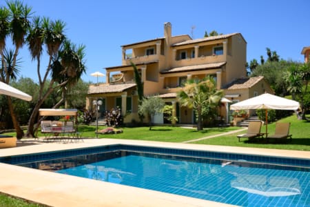 a large house with a pool
