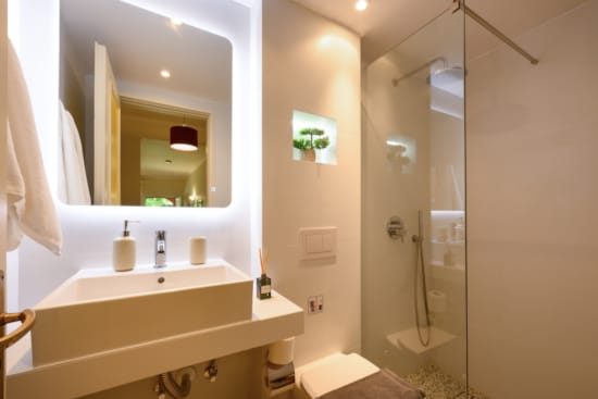 a bathroom with a glass shower
