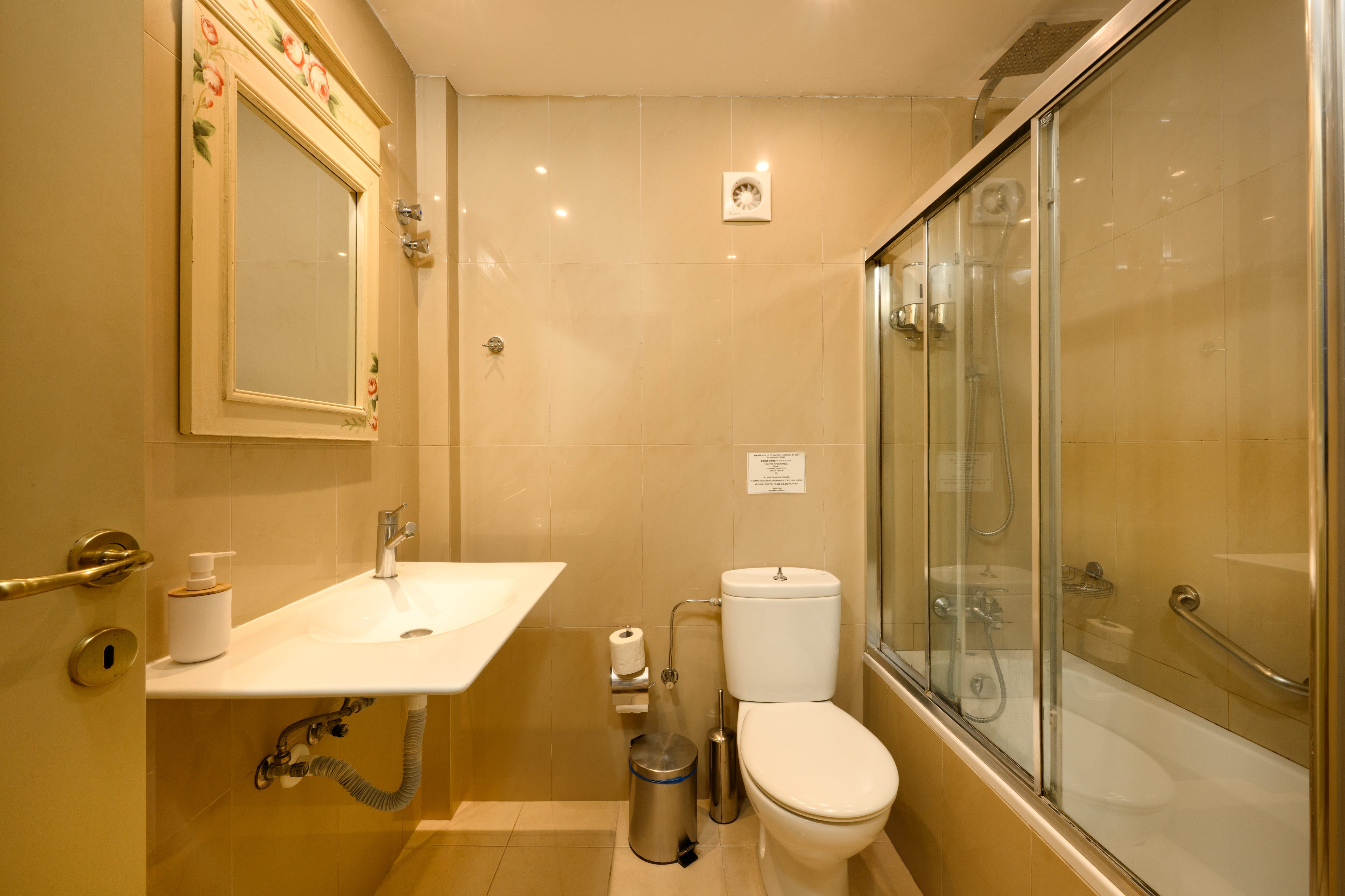 a bathroom with a glass shower
