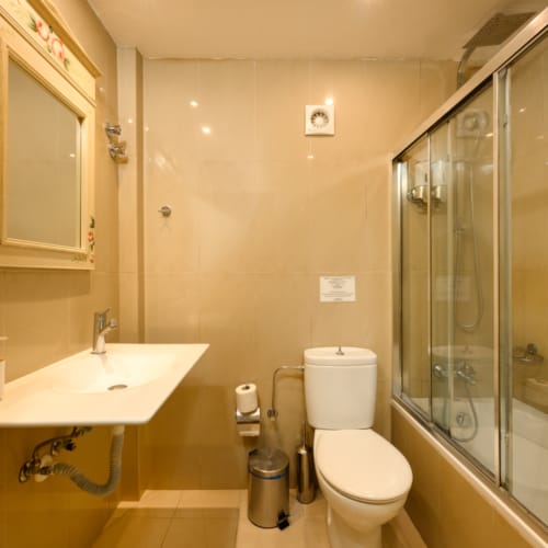 a bathroom with a glass shower