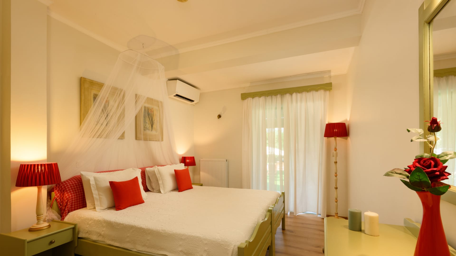 a bedroom with a bed and lamps