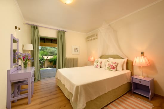 a bedroom with a large bed