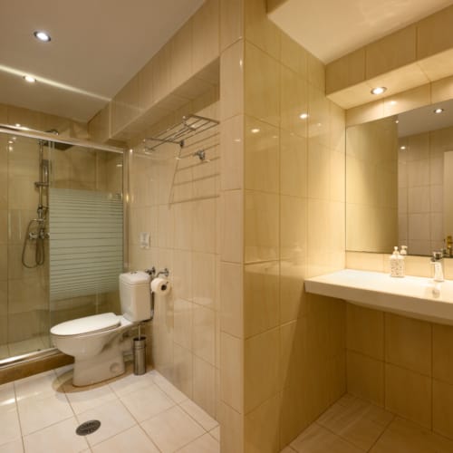 a bathroom with a glass shower