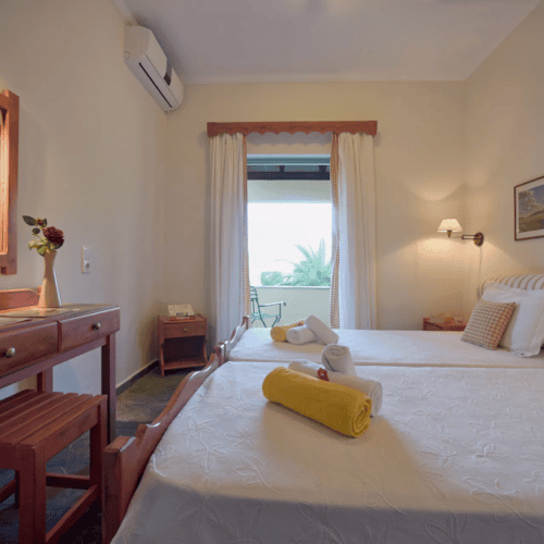 a bedroom with two beds